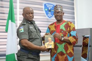 PRESENTATION OF A BOOK TO NEW IGP